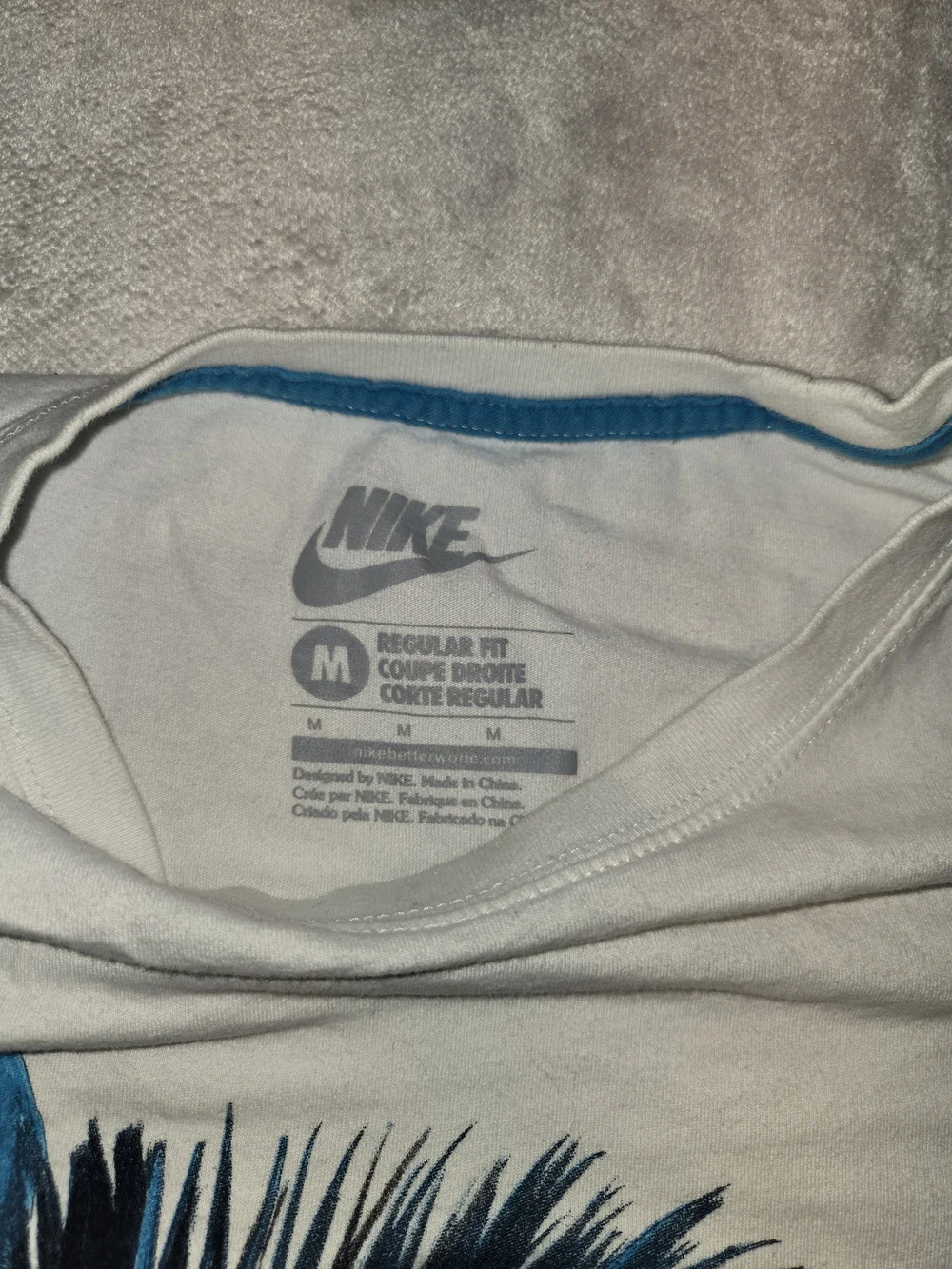 Nike White Short‑Sleeve Crewneck T‑Shirt with Blue Profile Graphic Warrior Tribe
